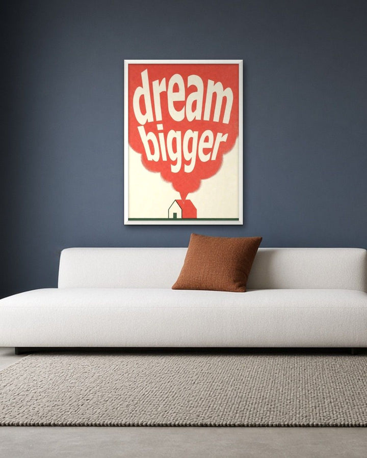 DREAM BIGGER framed on a wall