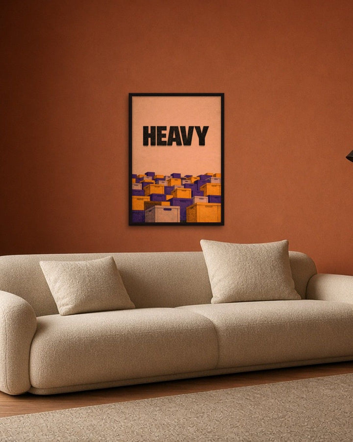 HEAVY framed on a wall