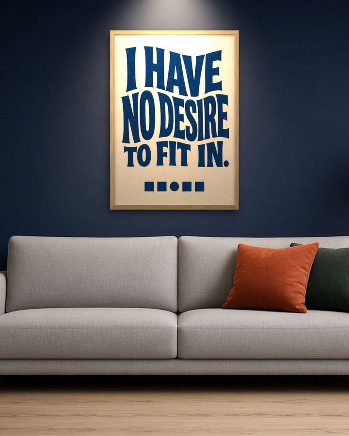 I HAVE NO DESIRE TO FIT IN · Cream / Navy framed on a wall