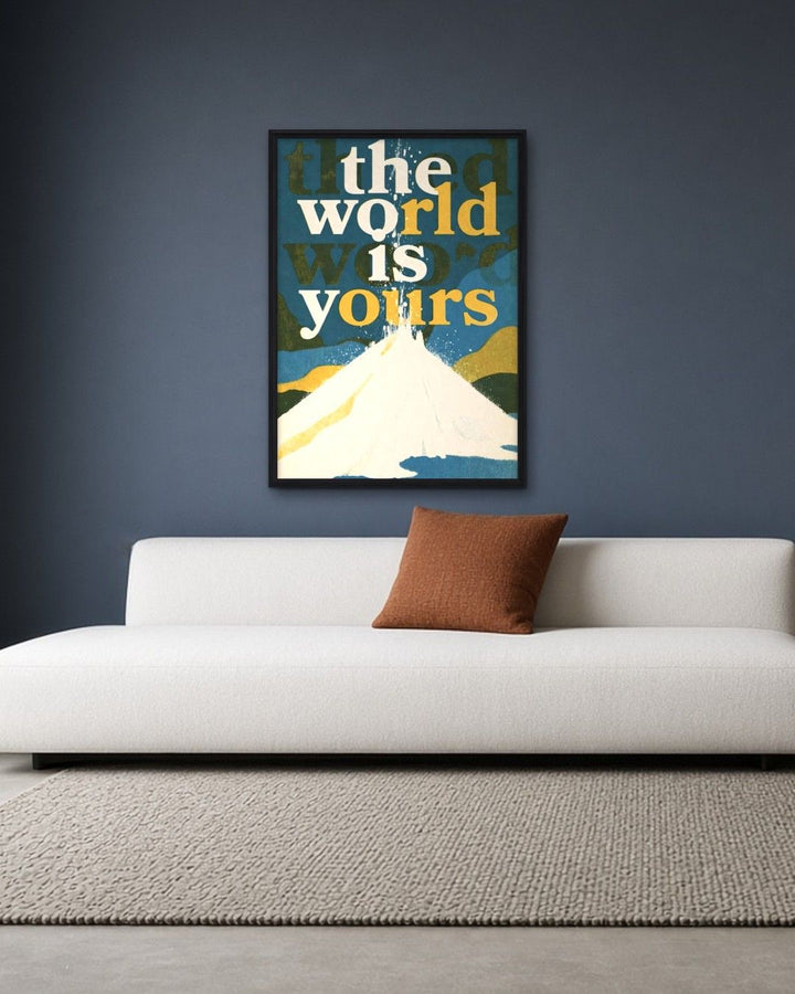 THE WORLD IS YOURS framed on a wall